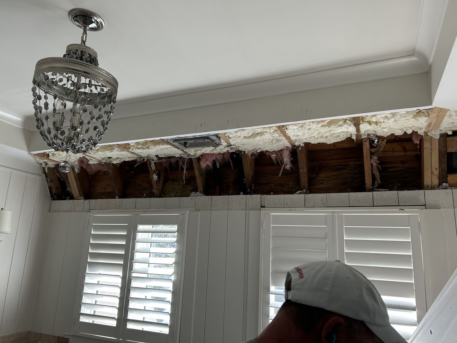 Ceiling opened along the wall for repair, with spray foam insulation by Burson Construction, Bluffton SC
