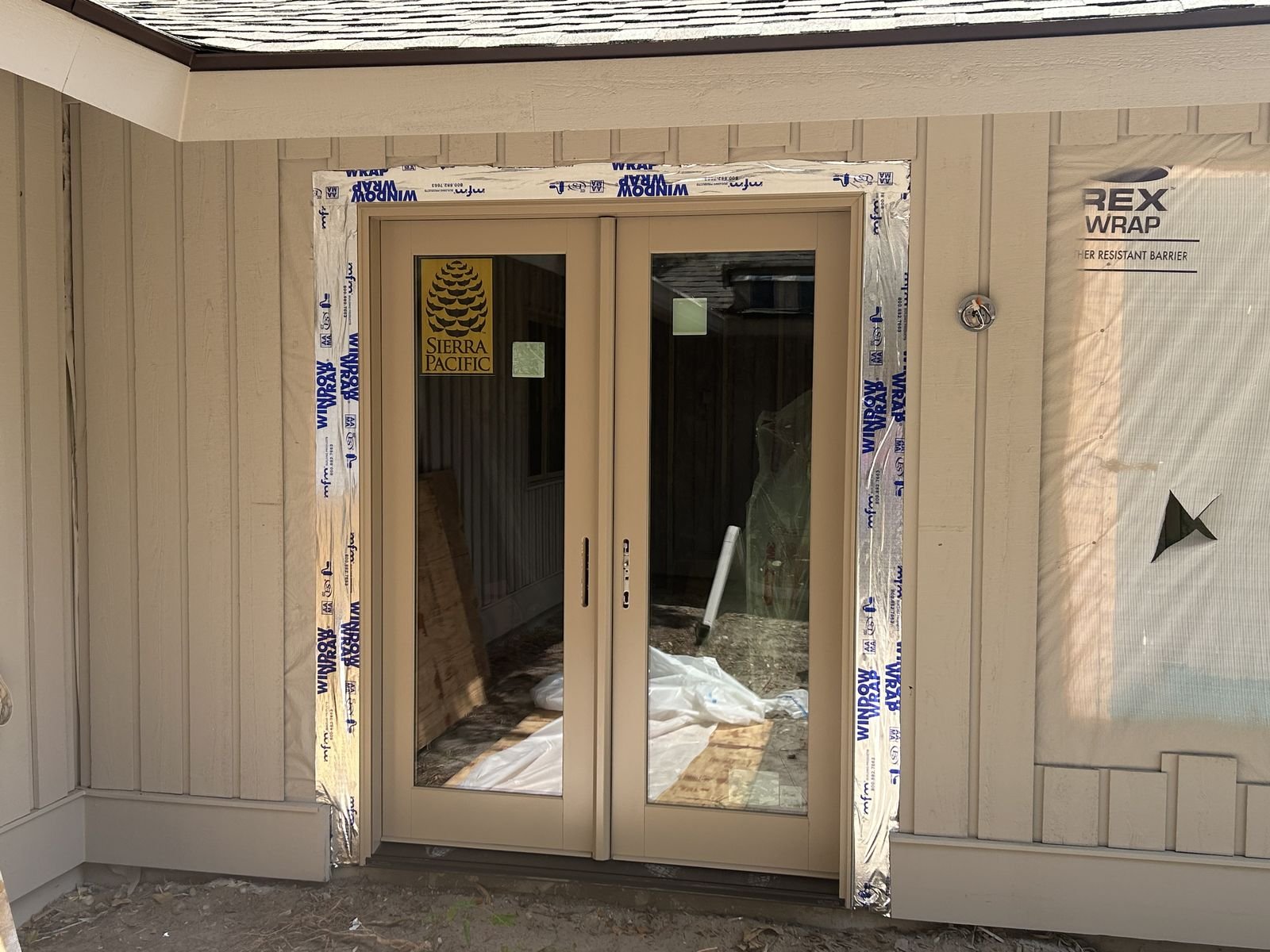 New French doors installed and flashed before trim by Burson Construction, Bluffton SC