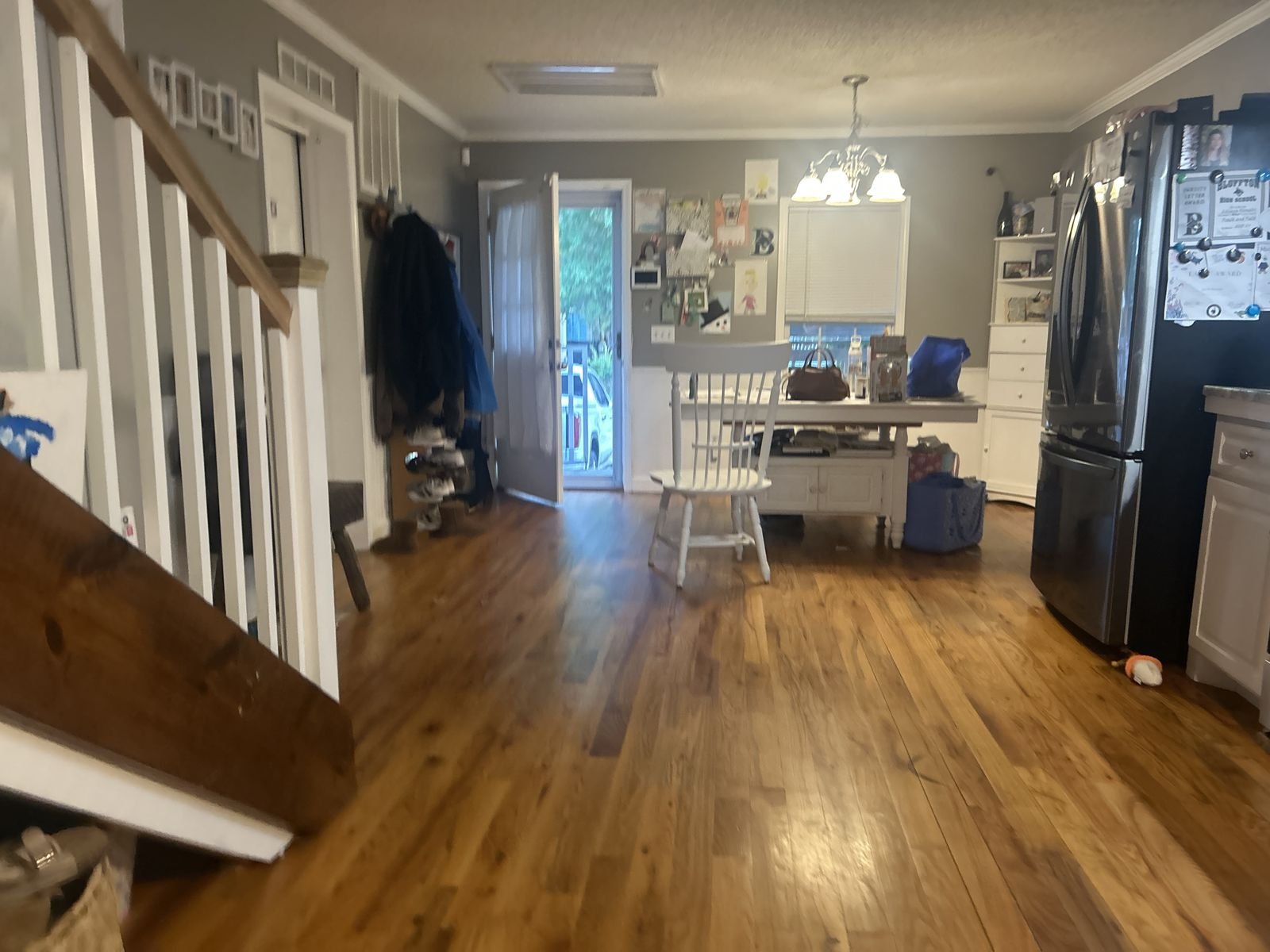 Hardwood floors running from the kitchen into the dining area by Burson Construction, Bluffton SC